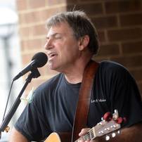 Mike Ball, of Dr. Mike and the Sea Monkeys performs during the AnnArbor.com Summer Concert Series on Friday afternoon. Melanie Maxwell I AnnArbor.com